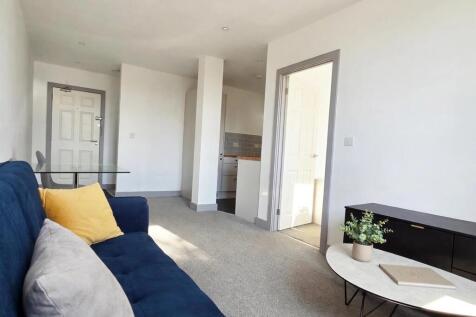 03_Living_Room_Sofa_Angle.jpg