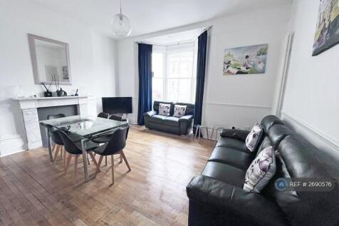 Living Room: Dining Seating For 8, 2 Large Sofas
