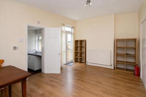 09_living_dining_room_straightened.jpg