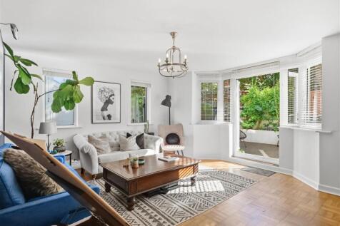 Open patio doors from lounge to garden