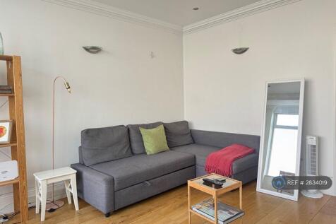 Living Room And Open Kitchen Area 