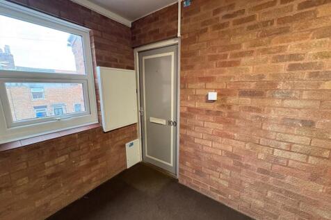 Entrance via shared stairwell