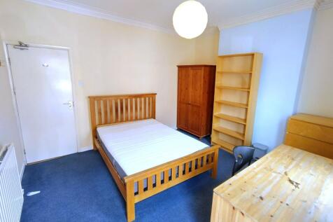 Bright double bedroom with ample storage space...