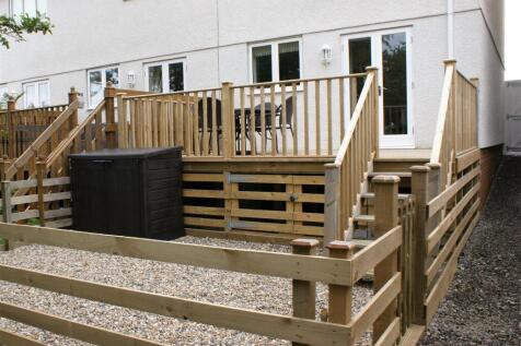 View towards the rear of the house and decking-gar
