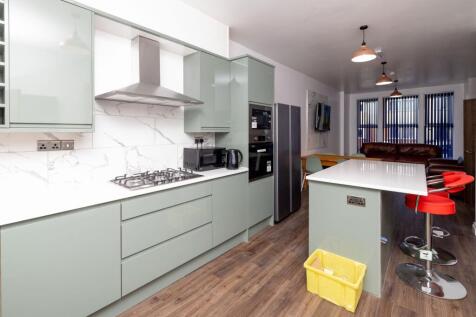 Contemporary kitchen with a central island, mod...