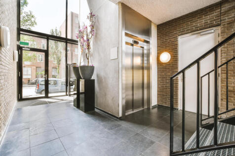 modern-elevator-in-apartment-building-hall-2025-02