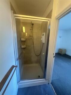 Bright and tidy modern walk-in shower unit....