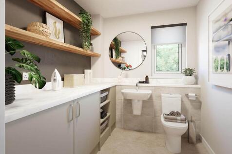 A guest cloakroom completes the ground floor