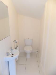 Neat, recently refreshed WC with a white toilet...