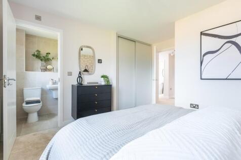 Bedroom 1 is complete with a private ensuite