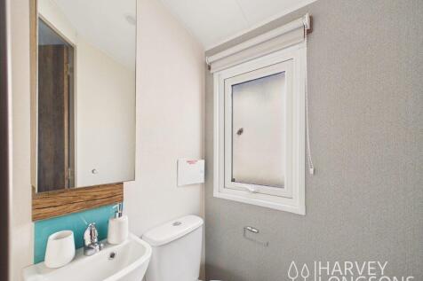 Modern bathroom with basin and toilet