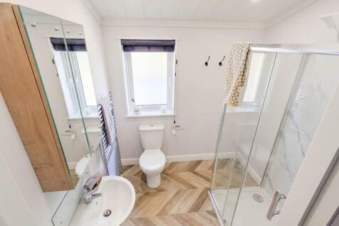 En Suite Shower Room With Toilet And Basin