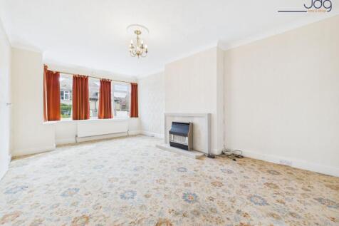 Living Room with Electric Fire and Bay Windows