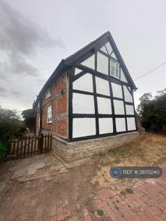 Side View Of The Property From The Road 