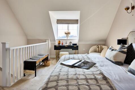 This impressive main bedroom occupies the entire second floor