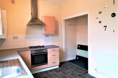 Bright kitchen with modern stainless-steel cook...