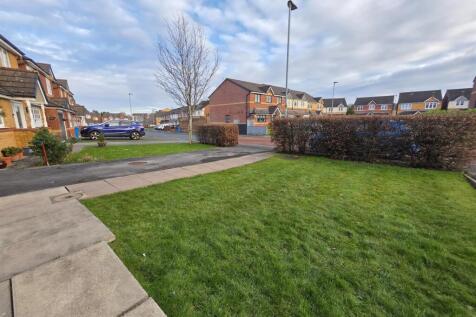 Front Garden to Driveway