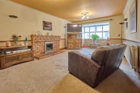 Open plan living/dining/kitchen to rear