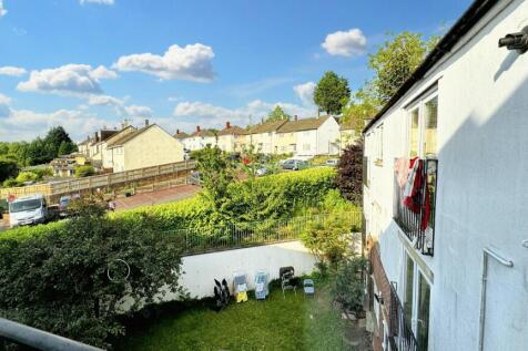 Lovely green garden view under a bright blue sk...