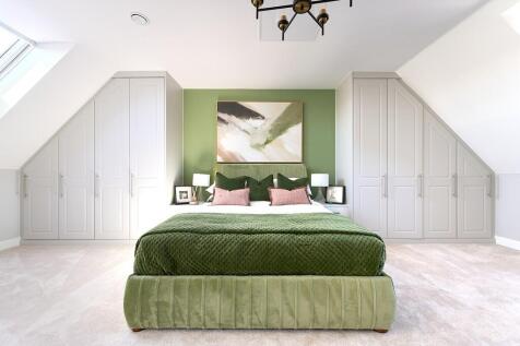 Spacious bedroom 1 spanning the entire second floor