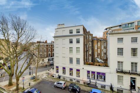 Elegant white buildings in a prime urban settin...