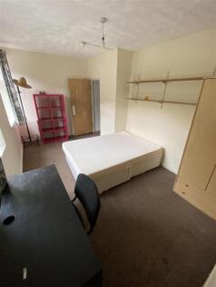 Bright double bedroom with ample storage space...