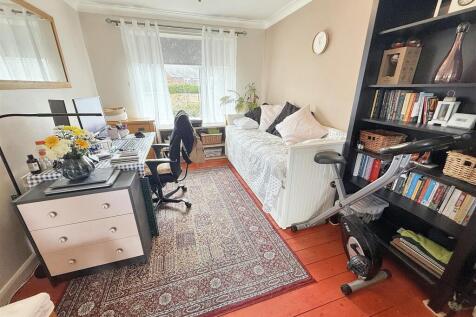 L Shaped Lounge through Dining Room