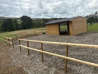 fenced field shelter