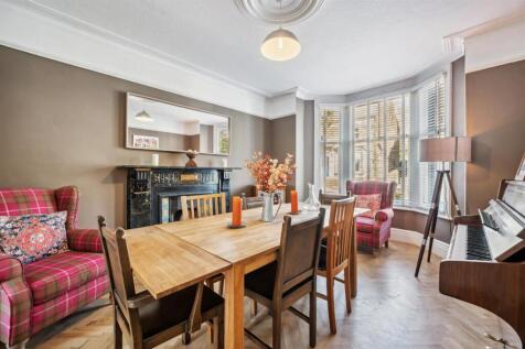 Dining Room to fireplace and bay window.jpg