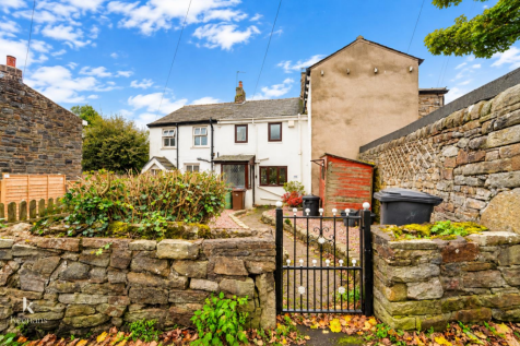 Cottage Garden Behind Wrought-Iron Gate.png