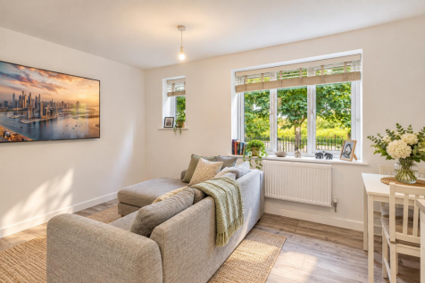 Bright Scandinavian Living Room with Greenery.png