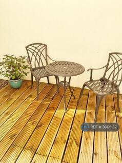 Patio With Cast Iron Garden Table And 2 Chairs