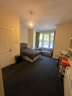 Bright, spacious room with large bay windows....