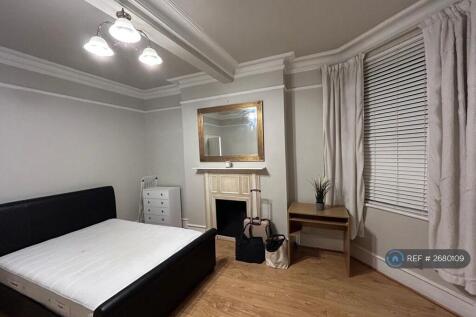 Living Room/Currently Used As a Second Bedroom