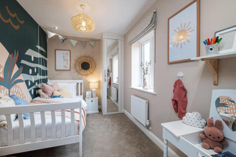 Children's bedroom with abstract wall mural