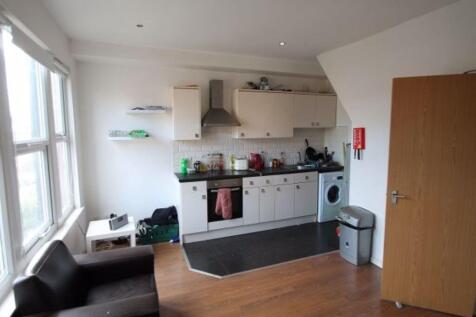 Bright and functional kitchen with ample natura...