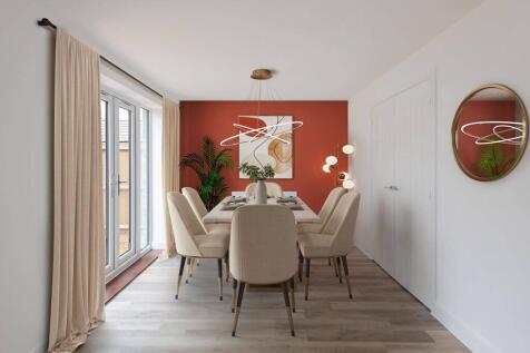 An open plan dining area also features double doors, making al fresco dining easy