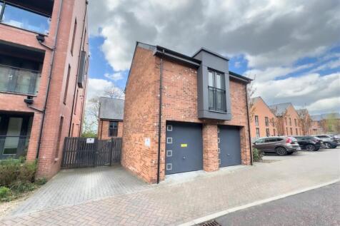 DOUBLE GARAGE WITH ROOM ABOVE