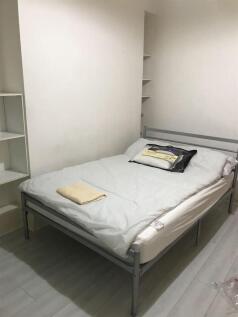 Simple double bedroom with neutral décor...