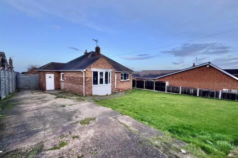 DRIVEWAY, STORE AND GARAGE