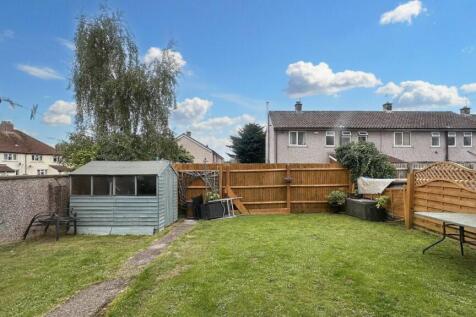 Spacious sunny lawn area with practical storage...
