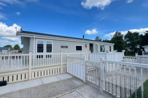 Front Entrance And Large Wraparound Decking At The