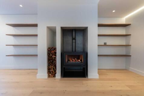 Wood Burning Fireplace in Lounge of Flatlet