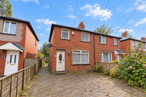 Weathered Red-Brick Semi-Detached Home.png
