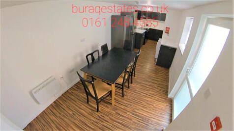 Spacious open kitchen with large dining table...