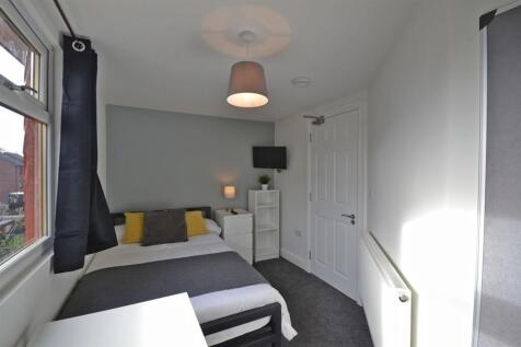 Modern bedroom with stylish decor and storage...