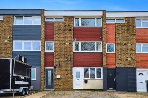 Terraced townhouses with modern cladding.png