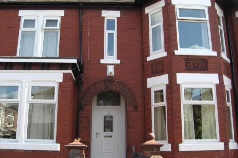 Exterior view of a charming red brick house wit...