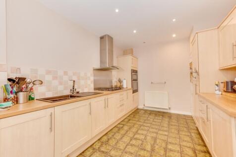 KITCHEN, UTILITY ROOM, DINER AND LIVING ROOM