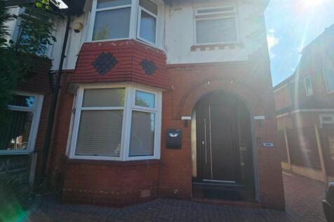 Charming exterior of a traditional brick home...